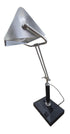 Used adjustable metal desk lamp with articulated arm and built-in power outlet from Southern Hospitality Liquidation.