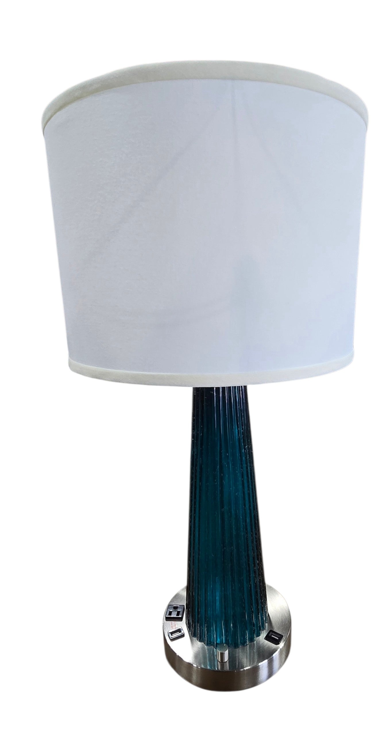 Used blue ribbed glass table lamp with white drum shade, USB charging ports, and power outlets from Southern Hospitality Liquidation.