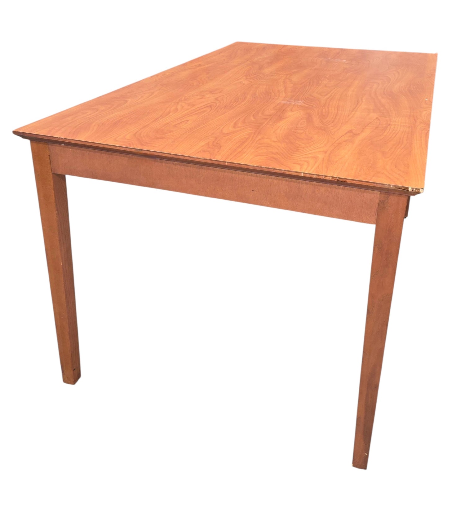 Angled view of a used commercial wood laminate dining table, quality used resort furniture sourced from an upscale resort and available at SHL.