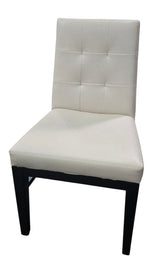 Used commercial cream upholstered dining chair with black wood frame at Southern Hospitality Liquidation.