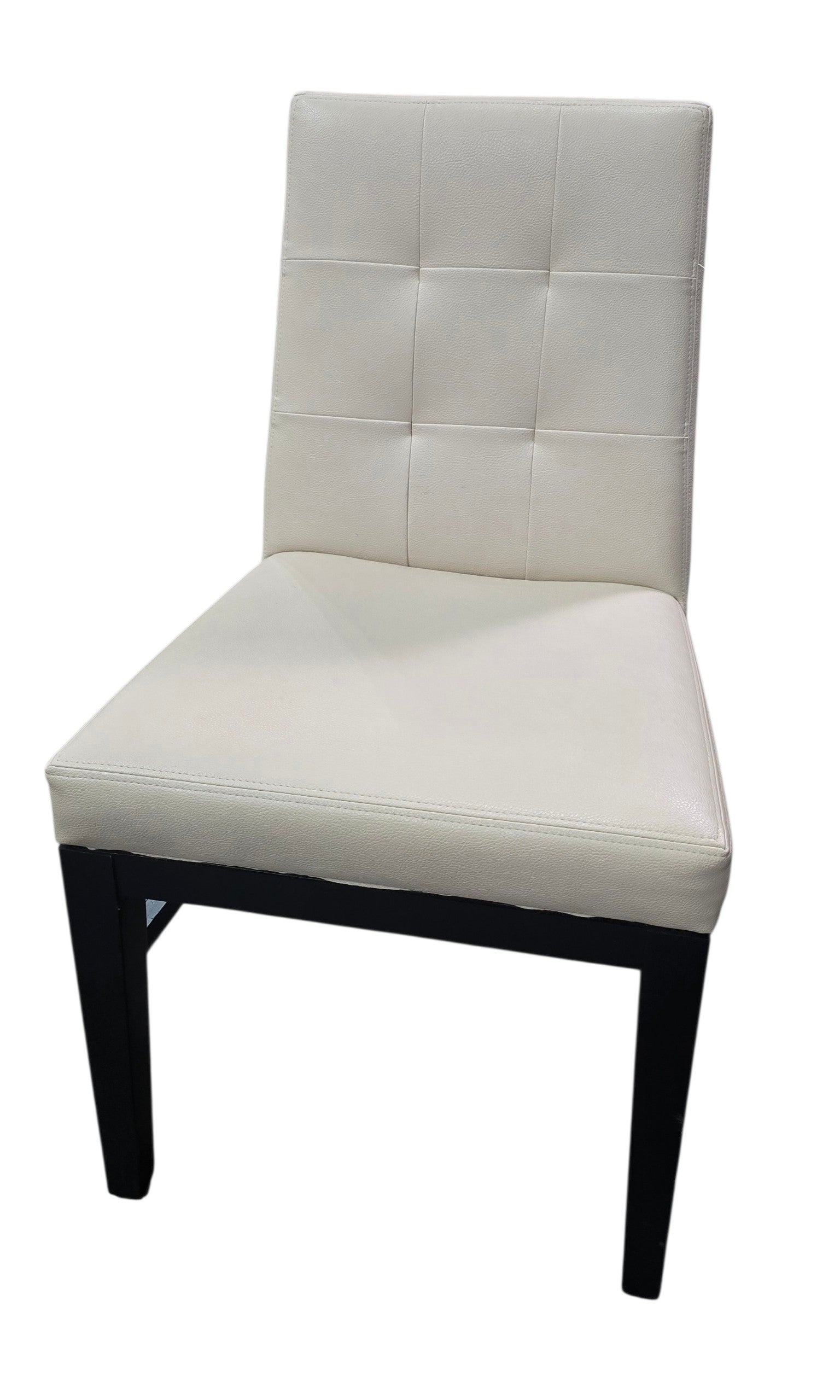 Used commercial cream upholstered dining chair with black wood frame at Southern Hospitality Liquidation.