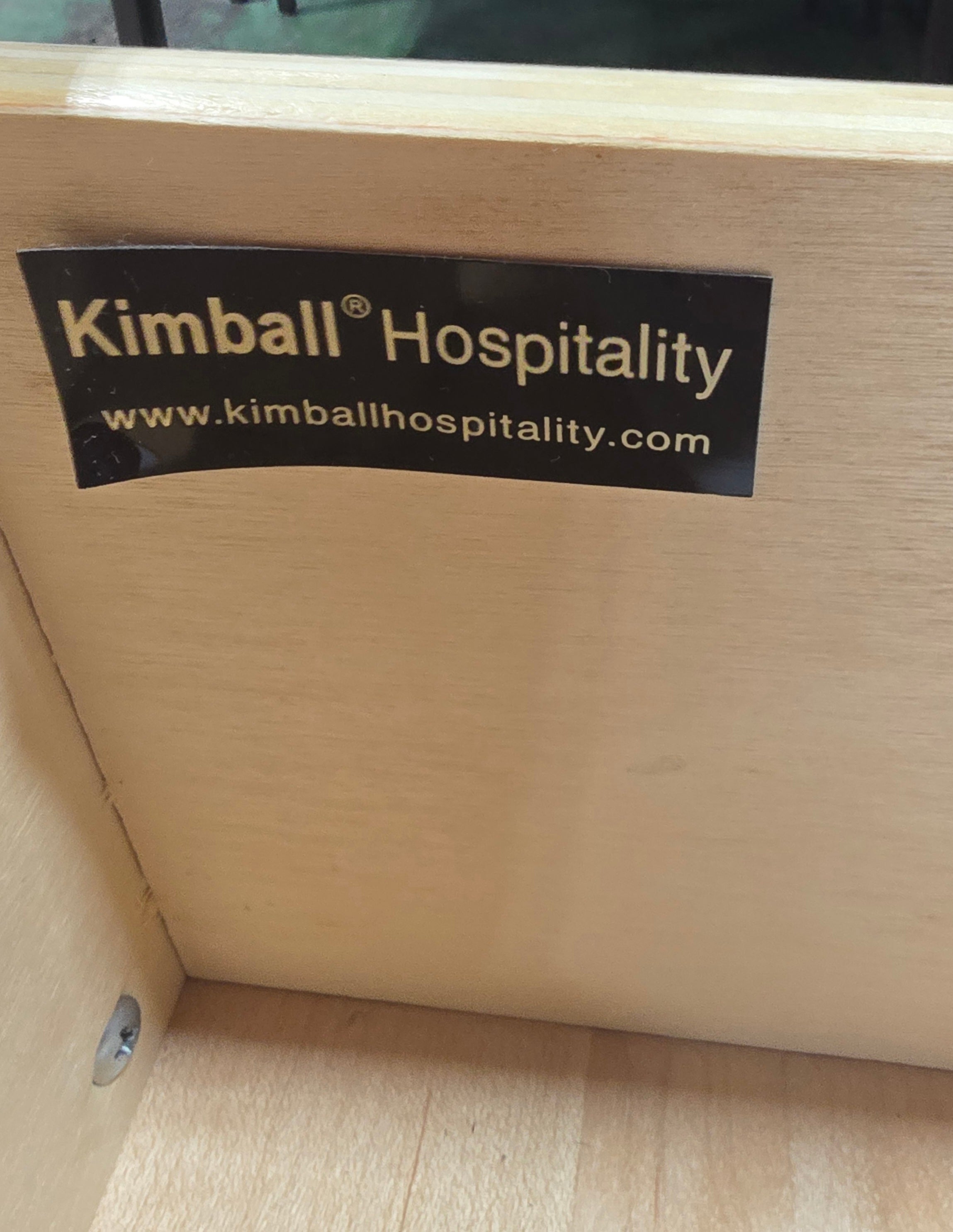 Kimball Hospitality manufacturer label on a used resort furniture dresser from Southern Hospitality Liquidation