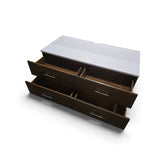 Used modern 4 drawer dresser with white granite top showing spacious storage drawers from Southern Hospitality Liquidation