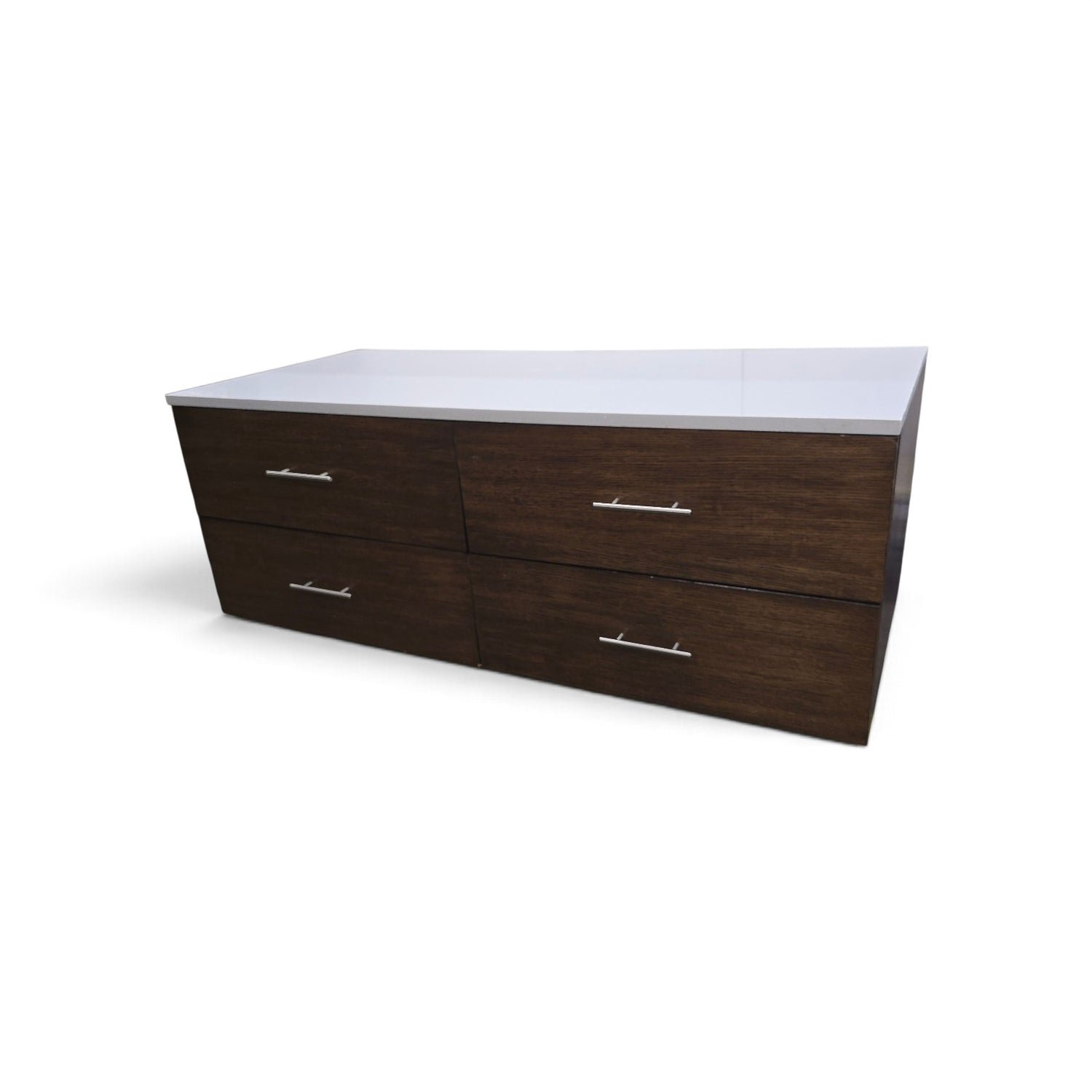 Used modern 4 drawer dresser with white granite top from Southern Hospitality Liquidation