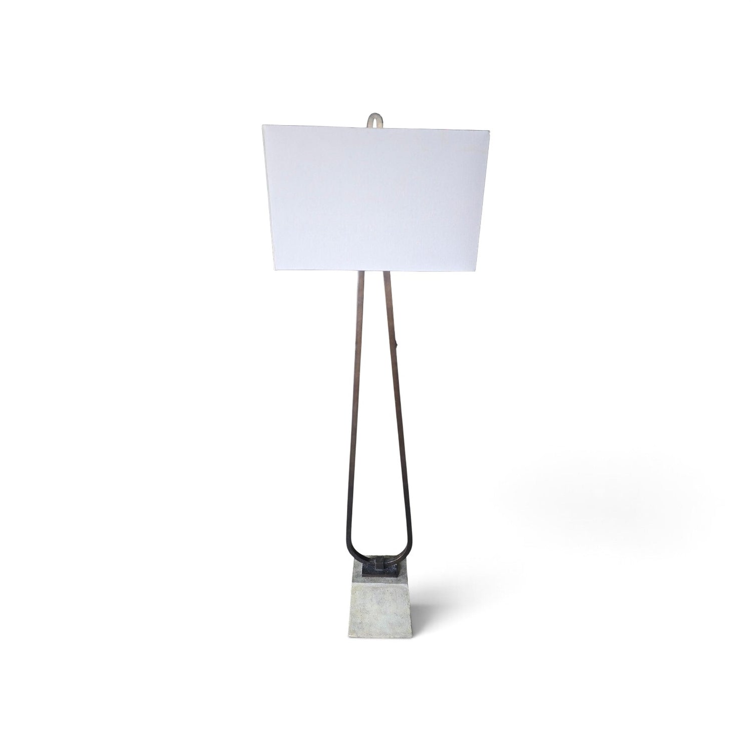 Used modern floor lamp with dark metal loop frame and stone base from Southern Hospitality Liquidation.