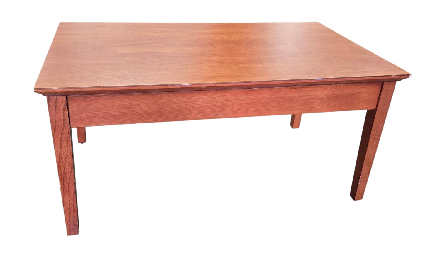 Used rectangular wood coffee table with cherry finish, front view, quality used resort furniture at Southern Hospitality Liquidation.