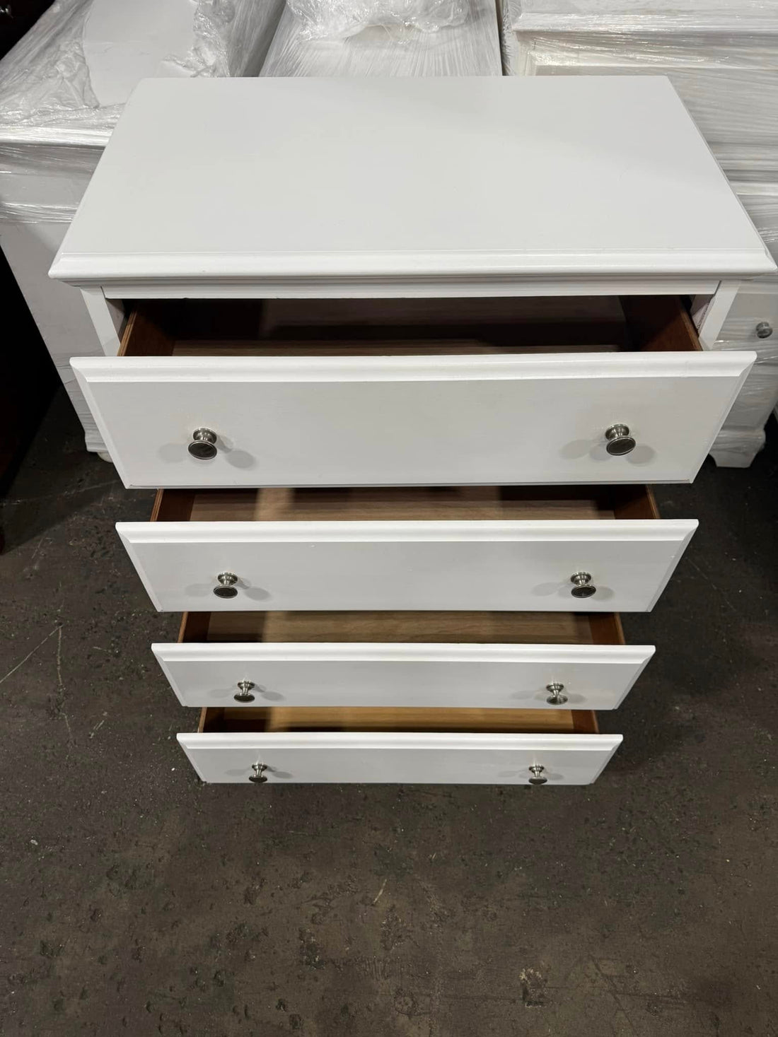 White 4-drawer chest with drawers open, coastal farmhouse furniture style
