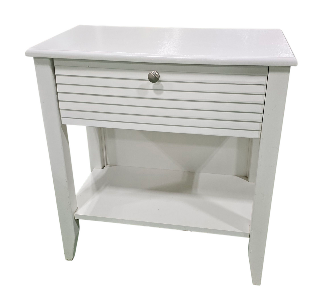 “White entry table with shutter-look front, farmhouse or coastal style, used and in good condition, sourced from upscale coastal resort”